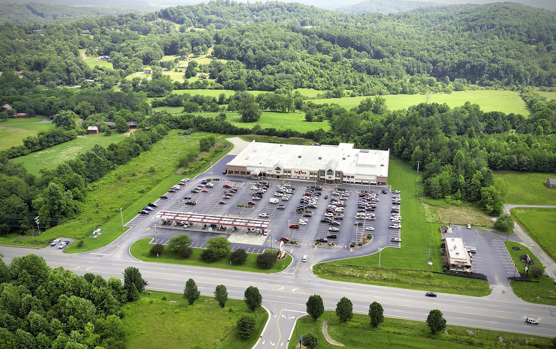An aerial of an Ingles grocery store and gas station in Hayesville, North Carolina